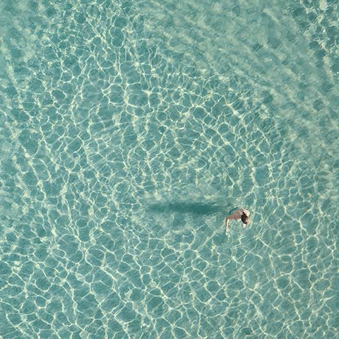 A women swims in St. Peter’s island during a Yoga Retreat at Casadisale